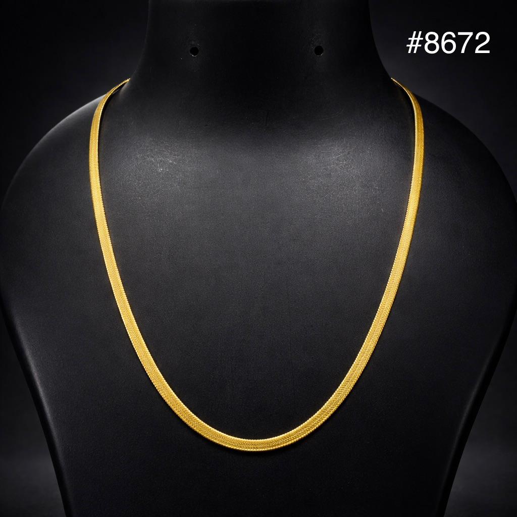 Gold rope chain necklace draped on a black mannequin bust against a dark background, showcasing its elegant texture and product number #8672.