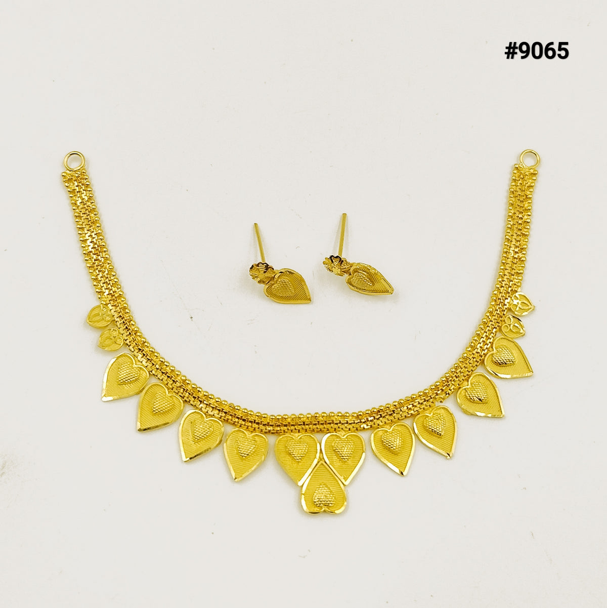 Gold necklace and matching earrings with layered chains and dangling heart-shaped charms, displayed on a white background; elegant jewelry set #9065.
