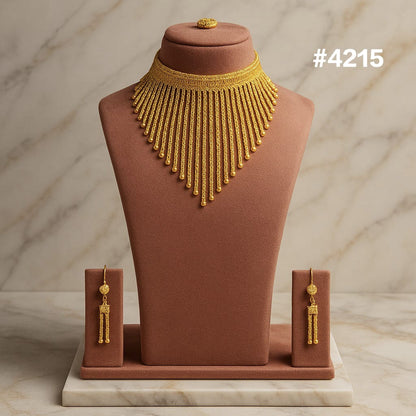 Gold beaded necklace with cascading strands and matching earrings displayed on a brown bust and stands against marble; elegant jewelry set #4215.