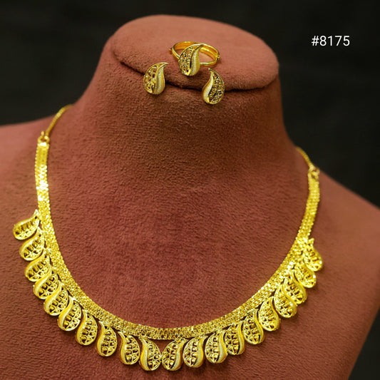 Gold necklace and earrings on a brown mannequin with a black background