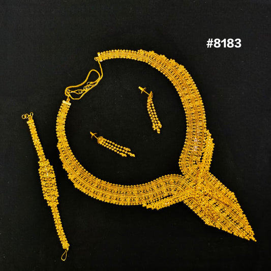 Gold lace necklace and earrings on a black background