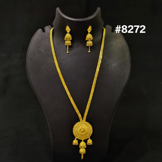 Gold necklace and earrings set on a black stand with '#8272' text.