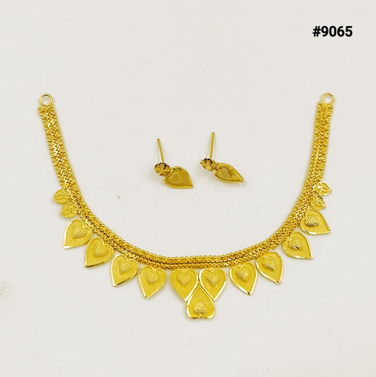 Gold necklace and matching earrings with layered chains and dangling heart-shaped charms, displayed on a white background; elegant jewelry set #9065.